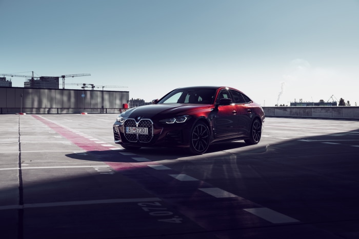 Red BMW 4 Series Gran Coupé M Sport on Parking Lot