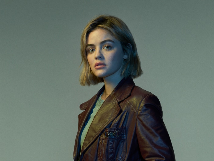 Lucy Hale in a brown leather jacket