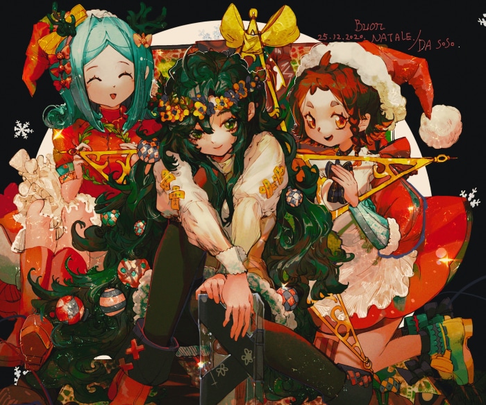 Three girls in Christmas outfits with Christmas tree decorations