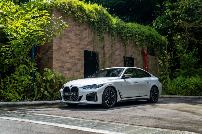 White BMW M440i xDrive Gran Coupé parked outdoors