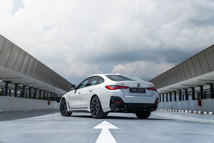 White BMW M440i xDrive Gran Coupé parked outdoors