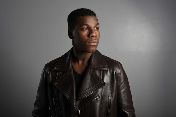 John Boyega in a leather jacket