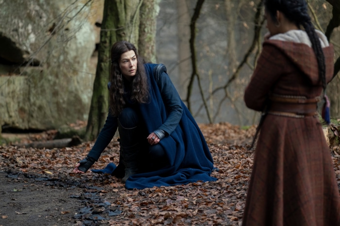 Moiraine Damodred from The Wheel of Time in a forest