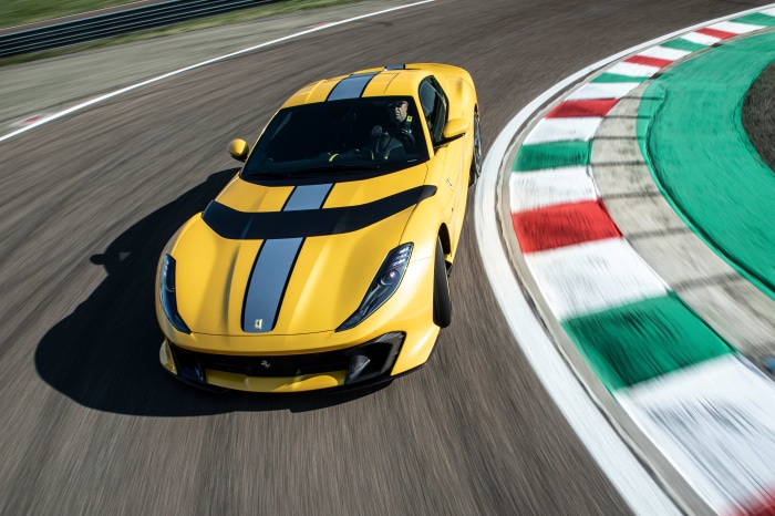 Yellow Ferrari 812 Competizione on a Race Track 4K