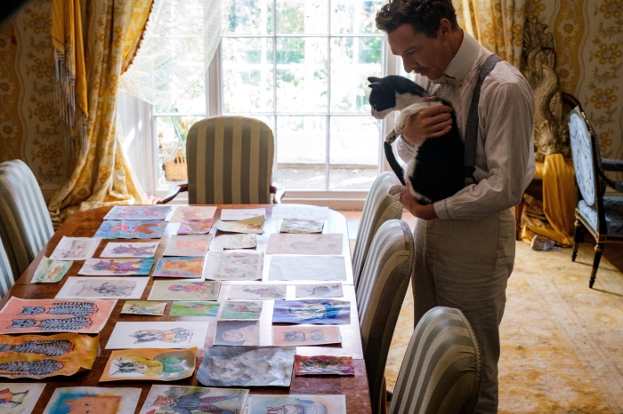 Benedict Cumberbatch holding a cat in The Electrical Life Of Louis Wain