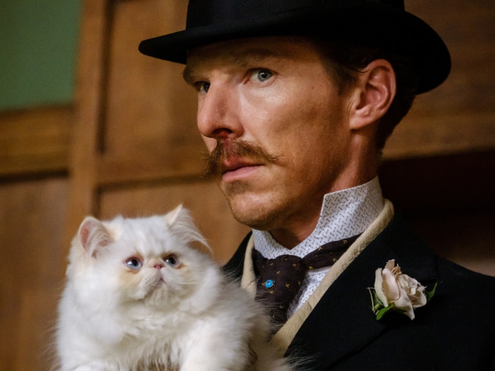 Benedict Cumberbatch as Louis Wain with a cat