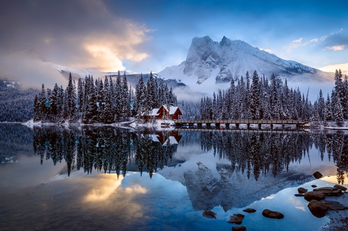 Snowy Forest and Mountain Reflected in Lake