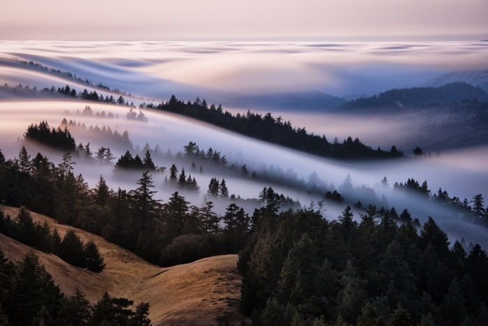 Foggy Mountains with Rolling Clouds