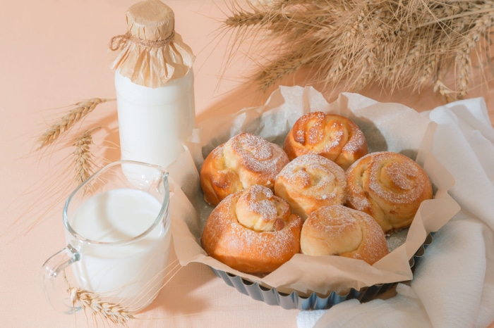 Still life with baked goods and milk