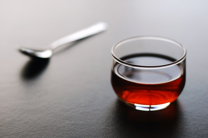 Tea in a glass with a spoon