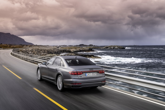 Audi A8 driving on a coastal road