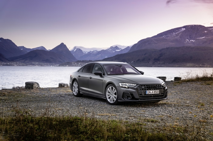 Audi A8 quattro S line sedan by a lake