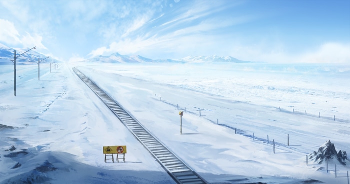Snowy landscape with train tracks and mountains