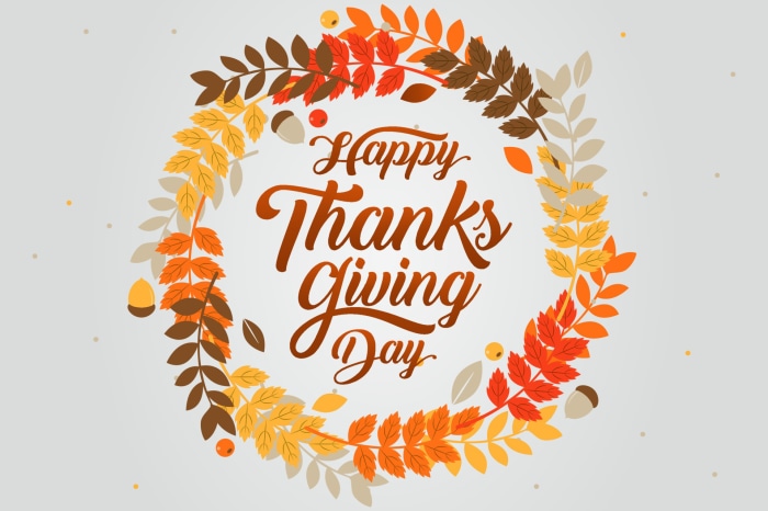 Happy Thanksgiving Day wreath with autumn leaves