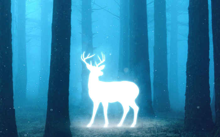 Fantasy glowing deer in a blue forest 4K
