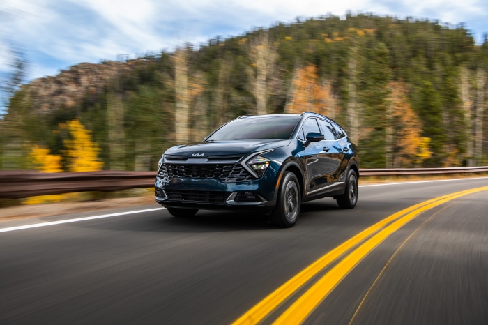 Kia Sportage HEV SUV on a mountain road