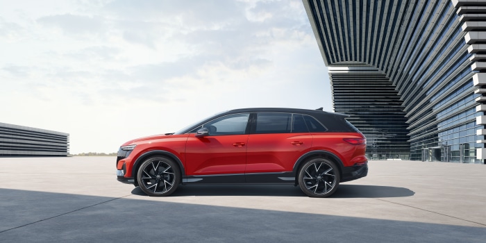 Red Audi Q5 50 E-tron Quattro electric SUV