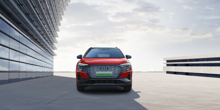 Red Audi Q5 50 E-tron Quattro electric SUV