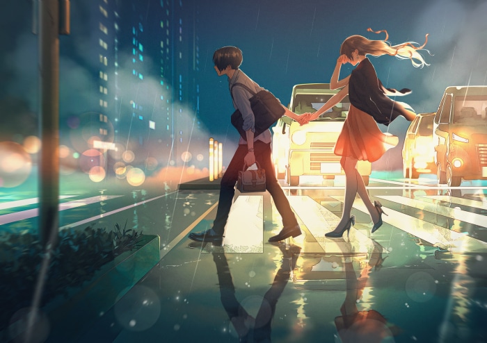 Couple walking in the rain at night