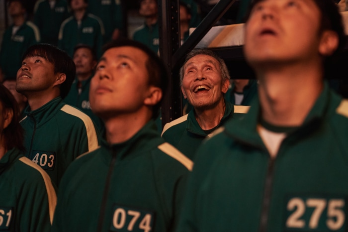 Squid Game contestants looking up