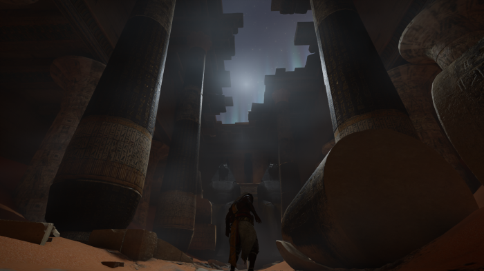 Bayek in ancient Egyptian temple ruins in Assassin's Creed Origins