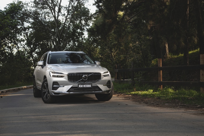 Silver Volvo XC60 Recharge SUV on a road