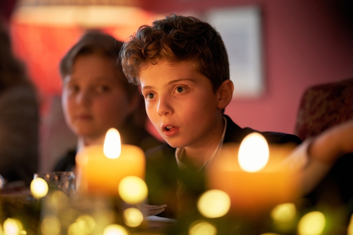 Roman Griffin Davis at a candlelit dinner