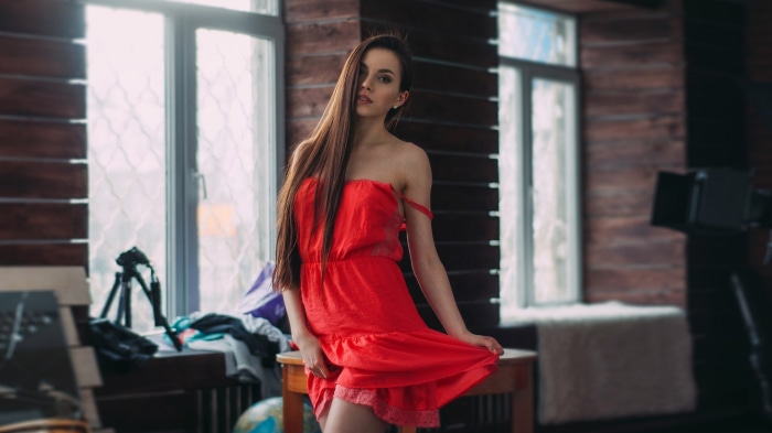 Brunette woman in a red dress