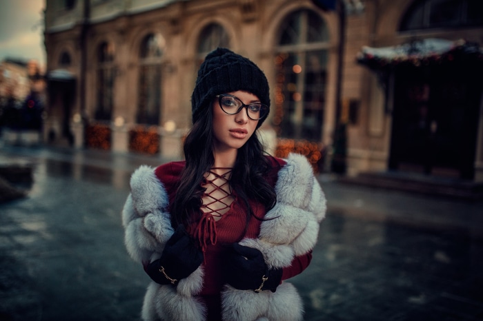 Nastya Salosina wearing a black hat and glasses