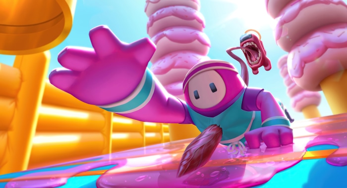 Fall Guys character and Among Us imposter in candy land