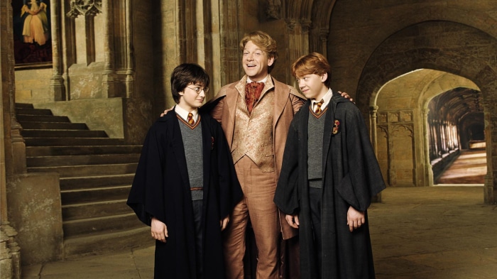Gilderoy Lockhart with Harry Potter and Ron Weasley