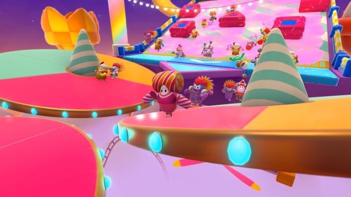 Fall Guys characters on a colorful obstacle course