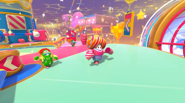 Fall Guys characters on a colorful obstacle course