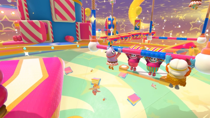 Fall Guys characters on a colorful obstacle course