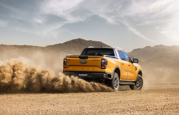Yellow Ford Ranger Wildtrak driving off-road