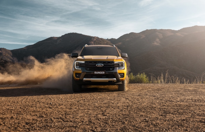 Yellow Ford Ranger Wildtrak driving off-road