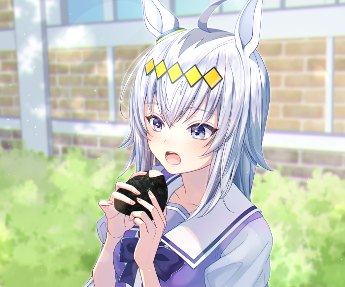 Oguri Cap from Uma Musume: Pretty Derby eating onigiri