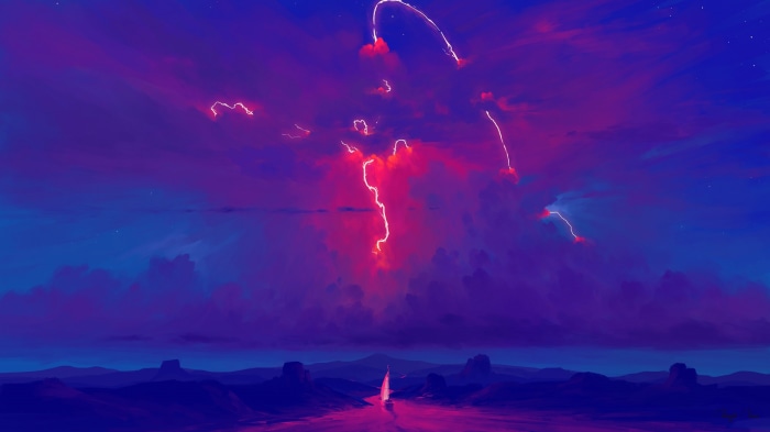 Lightning strikes over a desert landscape at night
