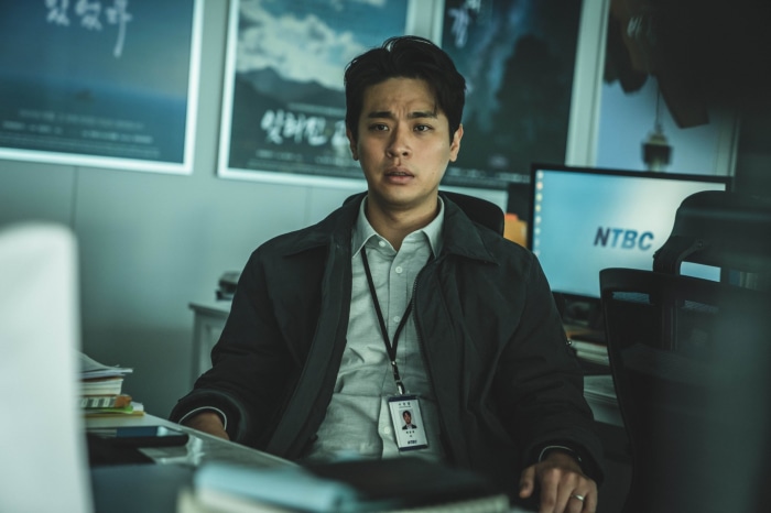 Man in office with NTBC monitor