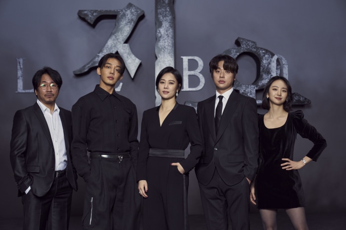 Hellbound cast posing for a photo