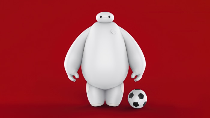Baymax from Big Hero 6 with a soccer ball