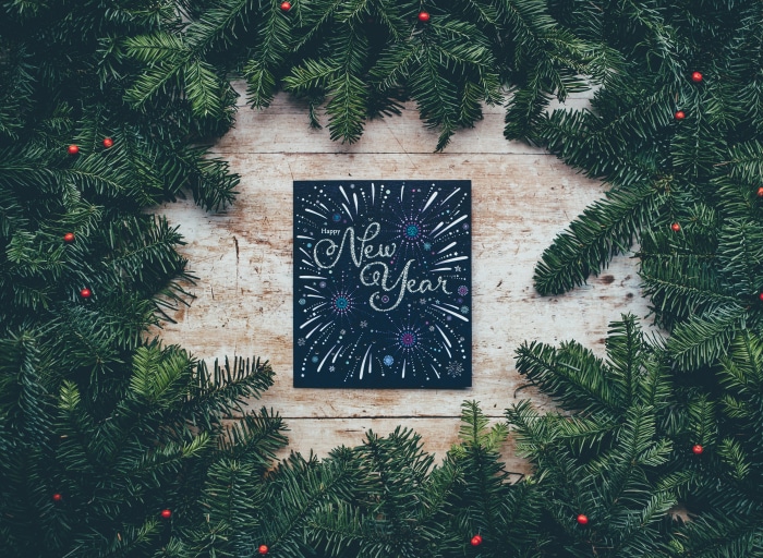 Happy New Year card with pine branches