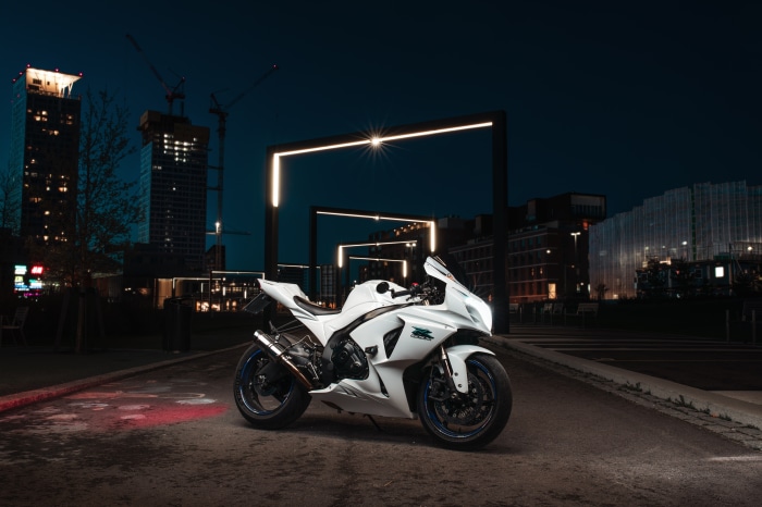 White Suzuki GSX-R1000R motorcycle at night