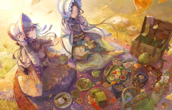 Two girls and a cat having a picnic