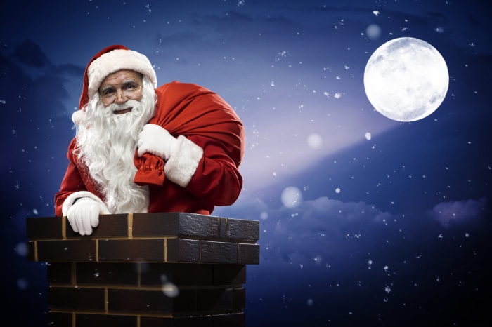 Santa Claus in Chimney with Gift Bag and Moon