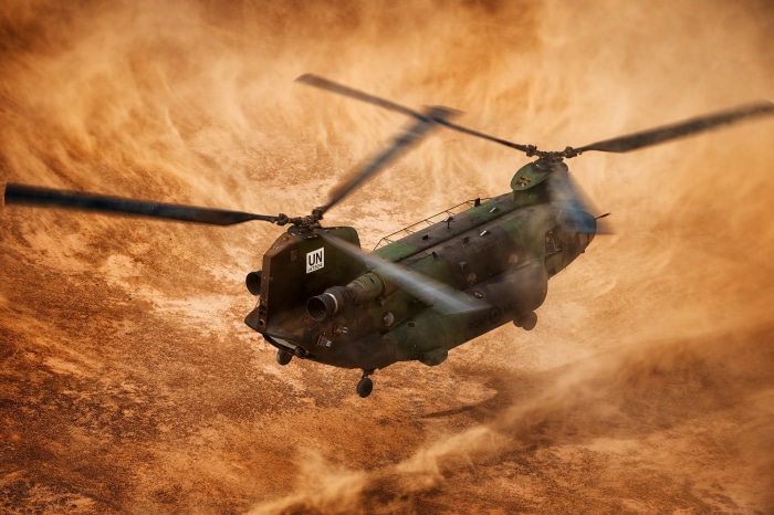 Canadian CH-147F Chinook helicopter in desert dust