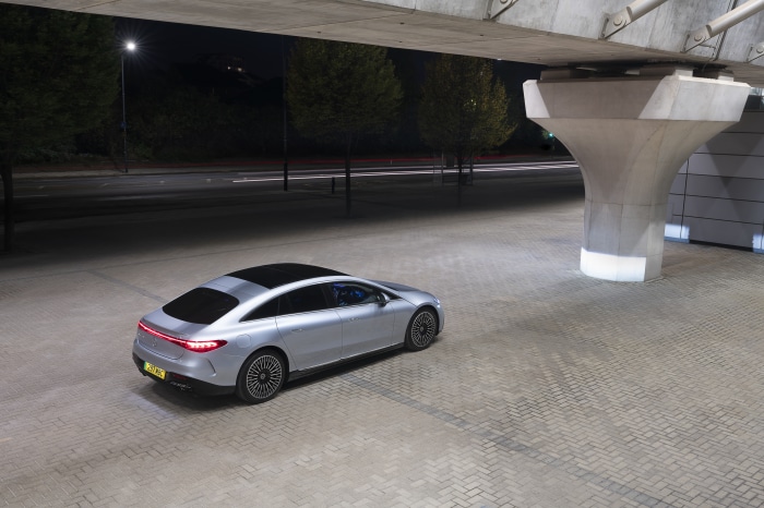 Silver Mercedes-Benz EQS 450 AMG Line parked at night