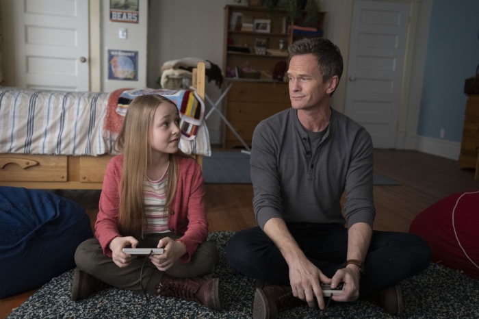 Neil Patrick Harris and Sophia Reid-Gantzert playing video games