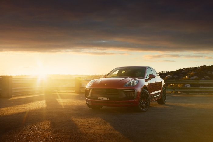 Red Porsche Macan GTS SUV at Sunset