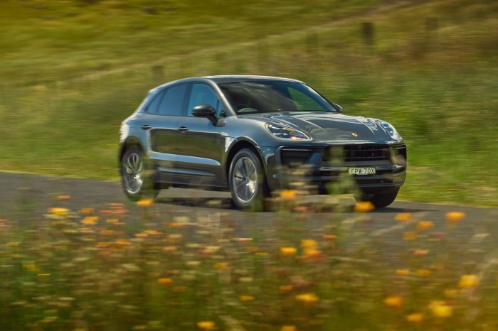 Porsche Macan SUV driving on a road